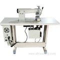 Ultrasonic tablecloth embossing and hemming machine in continuous operation